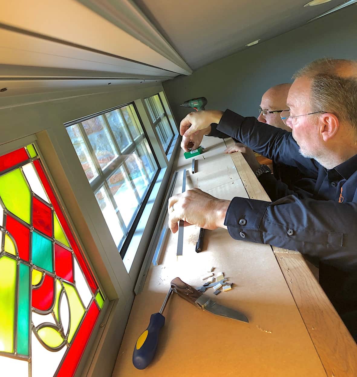 Placement d'un vitrail sur fenêtre existante
